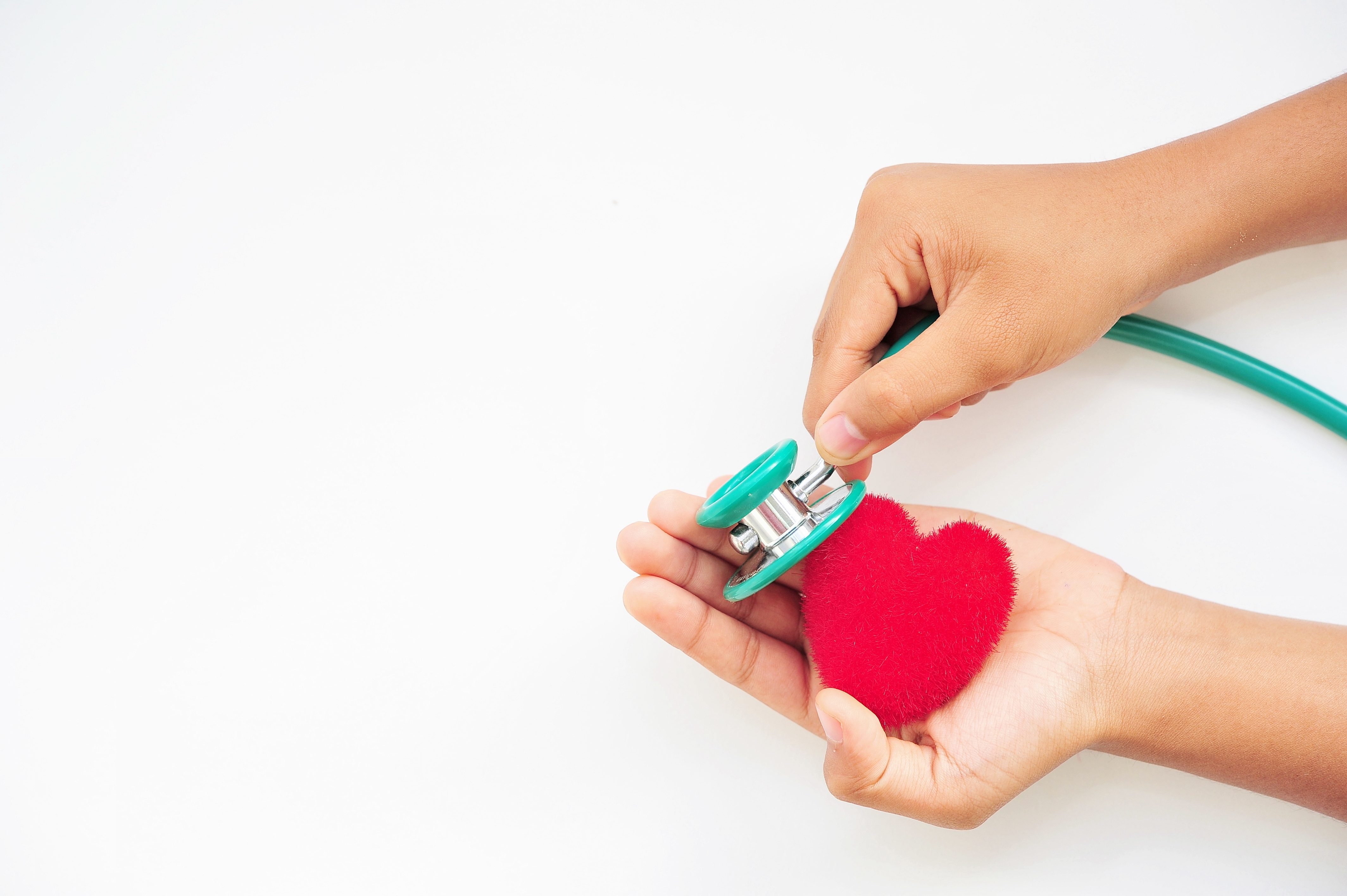 A stethoscope on a heart